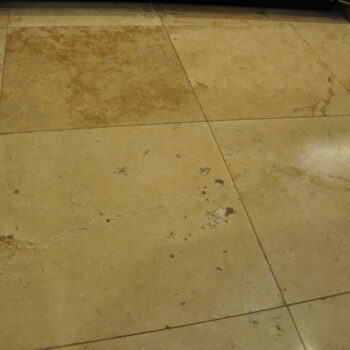 Travertine Holes In, Repair Travertine Floor Tile In A Kitchen